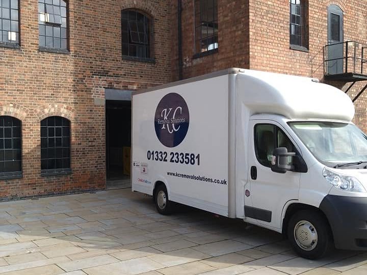 KC Removal Solutions clearance van at commercial premises