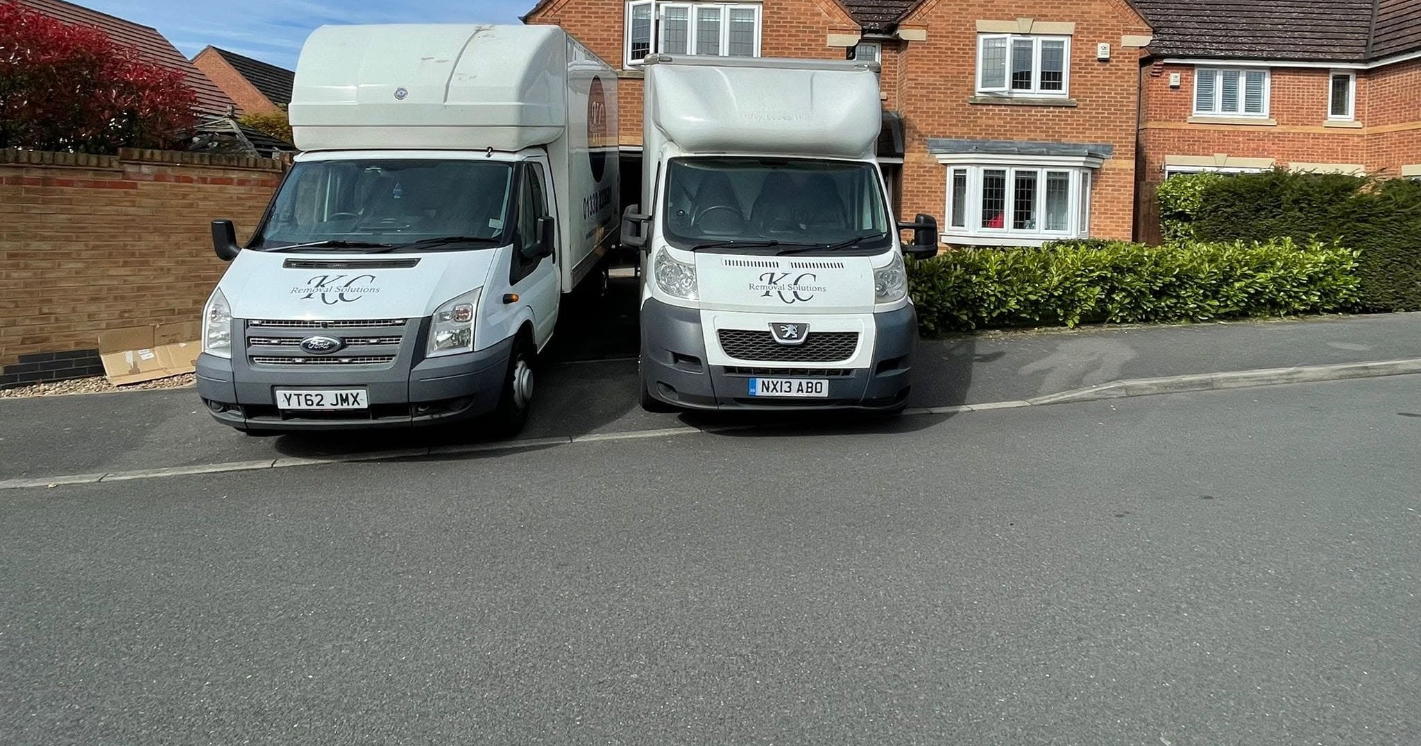 KC Removal Solutions vans parked in Derby
